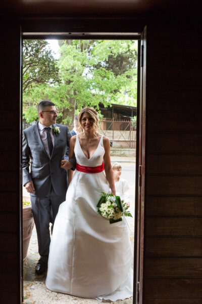 Bride and groom smiling during their wedding in Rome